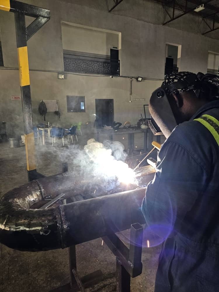 Arc welding in workshop
